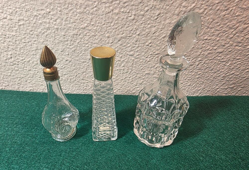 Vintage set of three perfume bottles